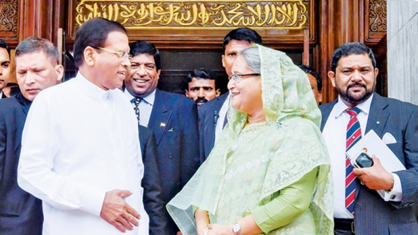 Sirisena And Rajapaksa Congratulate Sheikh Hasina On Her Landslide Election Victory: Opposition Calls Election &quot;Rigged And Farcical&quot;