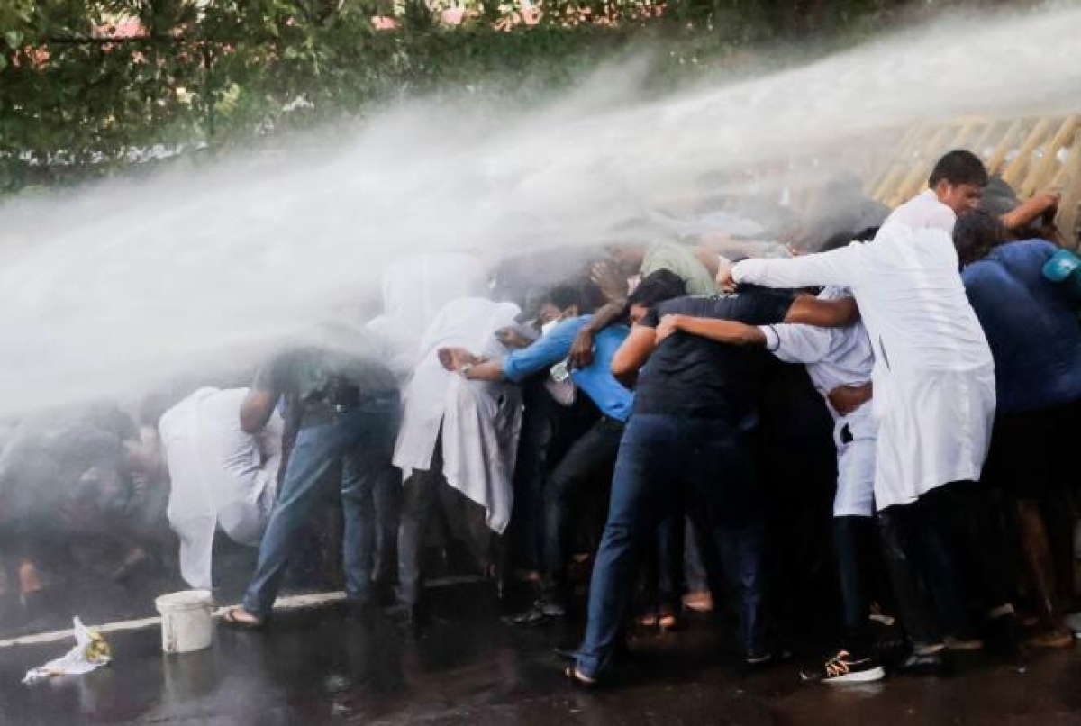 Police Deploy Water Cannons to Disperse NPP Women&#039;s Wing Protest Near Parliament Roundabout